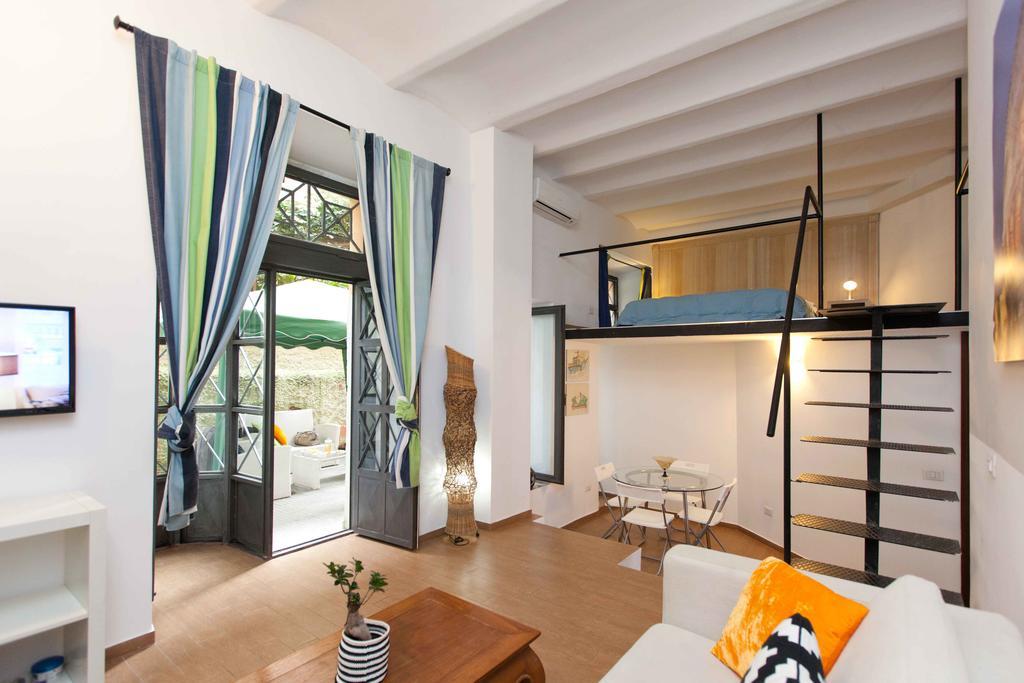Апартаменты Colosseo Accomodation Рим Экстерьер фото